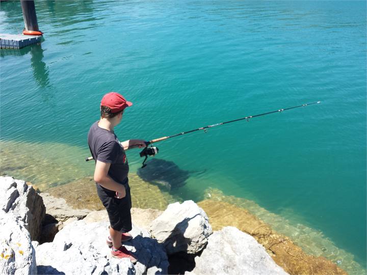 Fishing at the nearby Tarakohe Wharf 1 km
