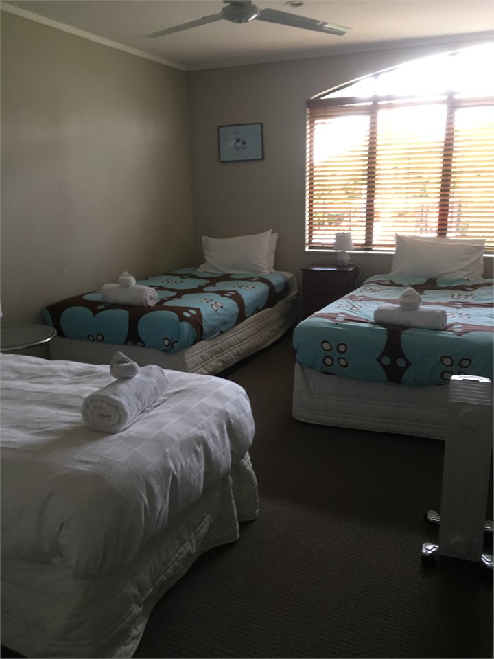 bedroom 4 2 king singles and a single bed, this is