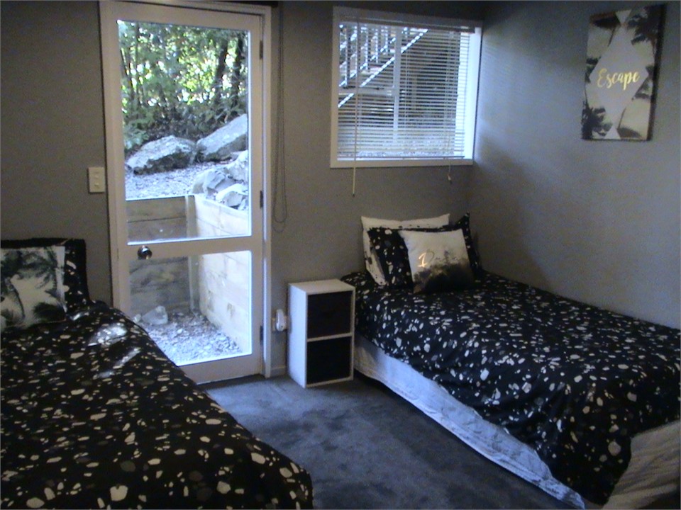 large bedroom downstairs sleeps 3 plus trundler