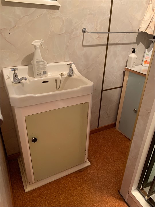 Simple little bathroom with shower