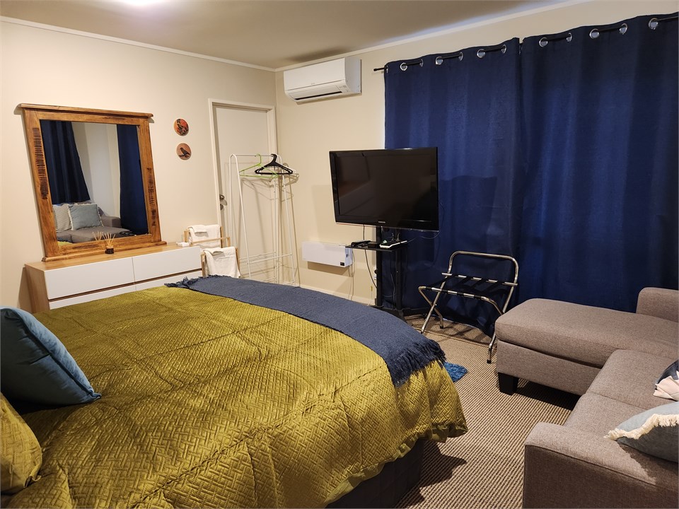 Master Bedroom with TV  & Sofa