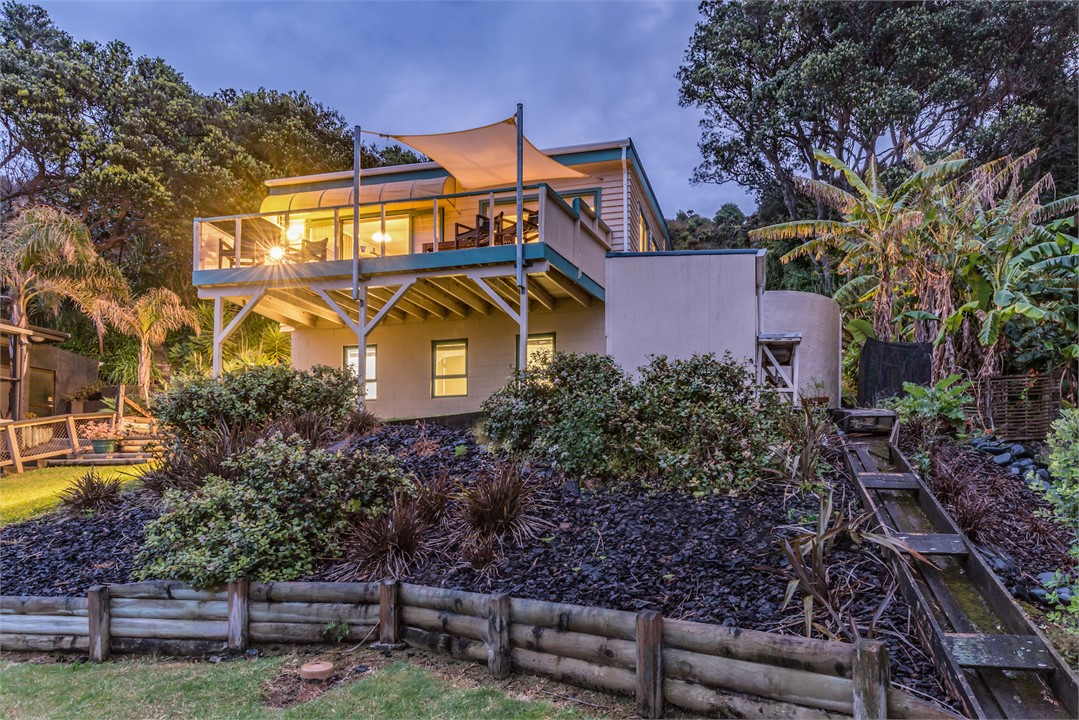 Beautiful night shot of Taupo Bay Beach House