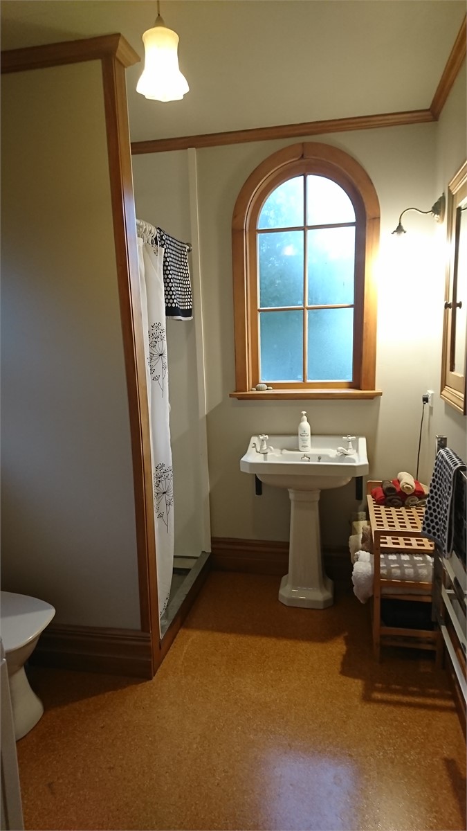 Second bathroom with laundry