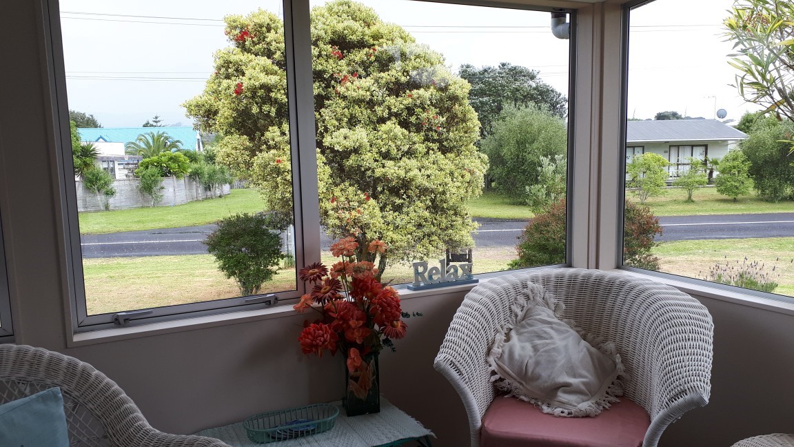 A lovely sunroom off the livingroom.
