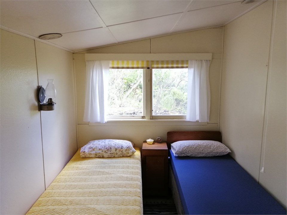 Two singles beds in back room