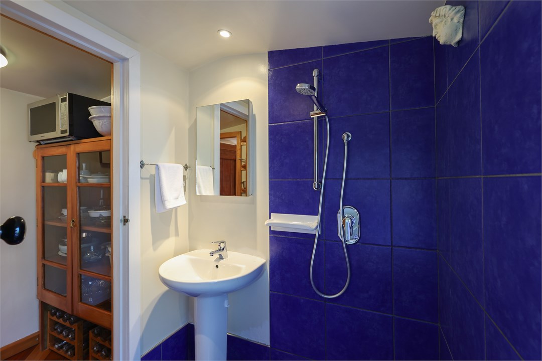 Shared bathroom, located off the kitchen