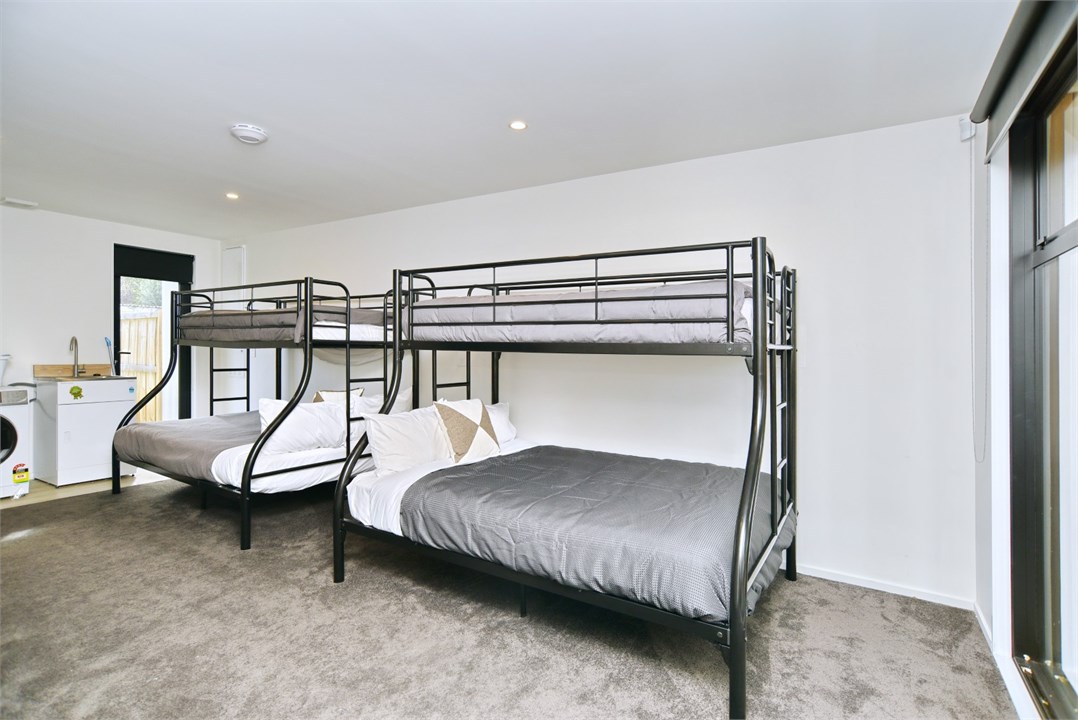 Bedroom 3 has 2 Bunk beds and a TV