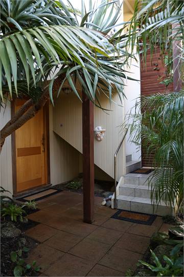 Main house entrance (Lt), "stairway to Haven" (Rt)