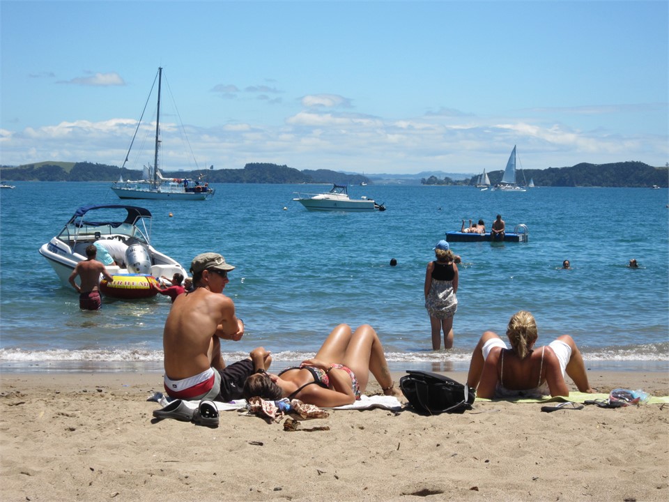 The sandy beach in front and diving pontoon