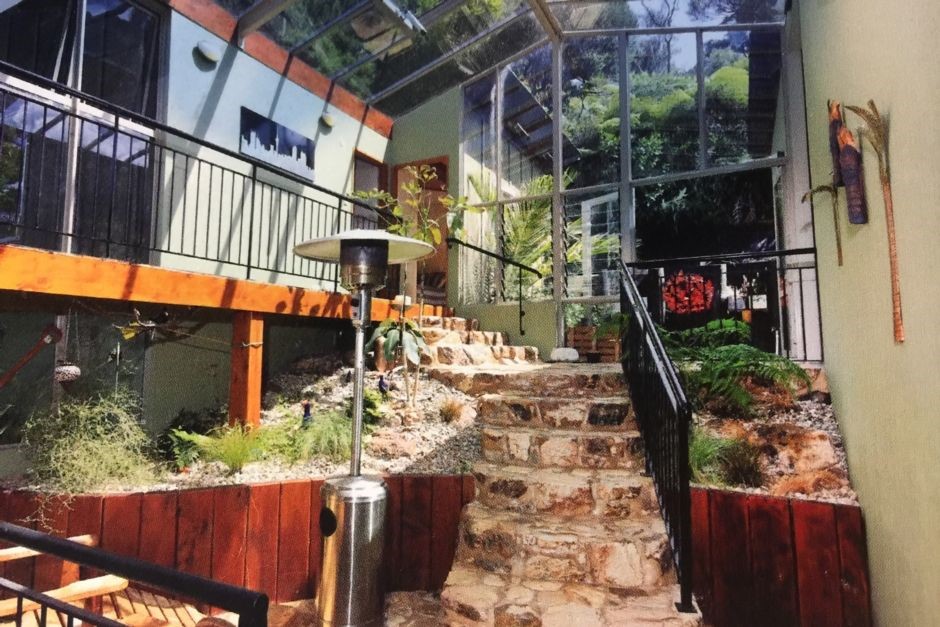 Warm internal Glass conservatory leads to upper be