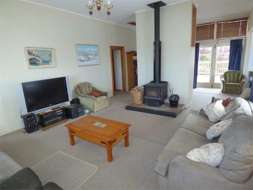 lounge with new fire , deck beyond