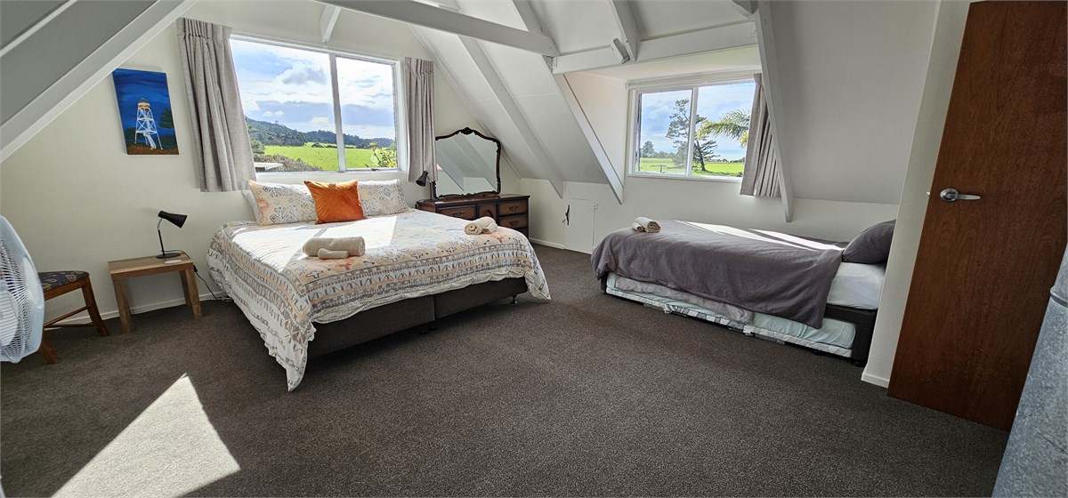Super king bedroom upstairs & two single beds