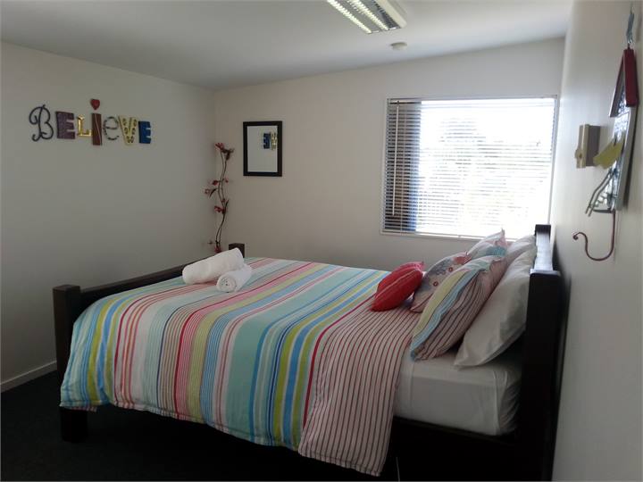 Queen Bedroom with garden and deck views
