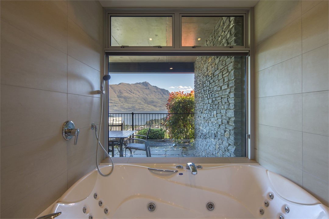 bedroom 2 ensuite with spa bath & separate shower