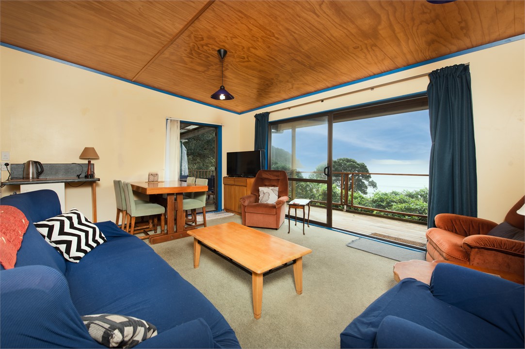 Open plan lounge, dining and kitchen.