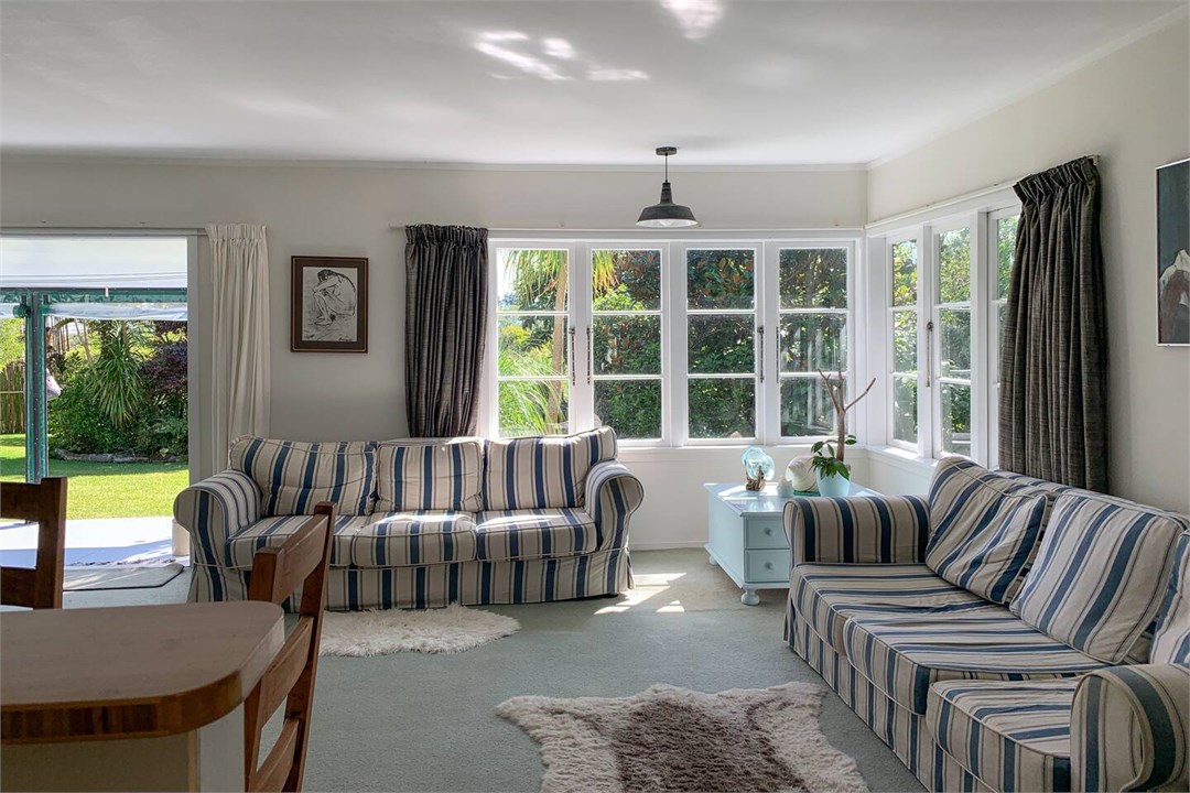 Lounge, showing french doors to outdoor enclosed s