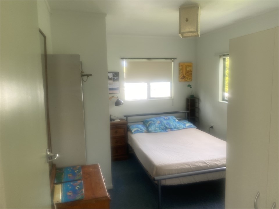 Double bedroom with wardrobe and dresser