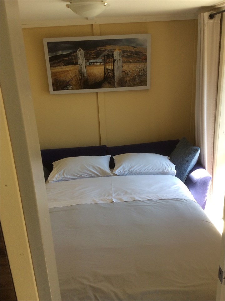 Sofa bed in lounge made into a bed