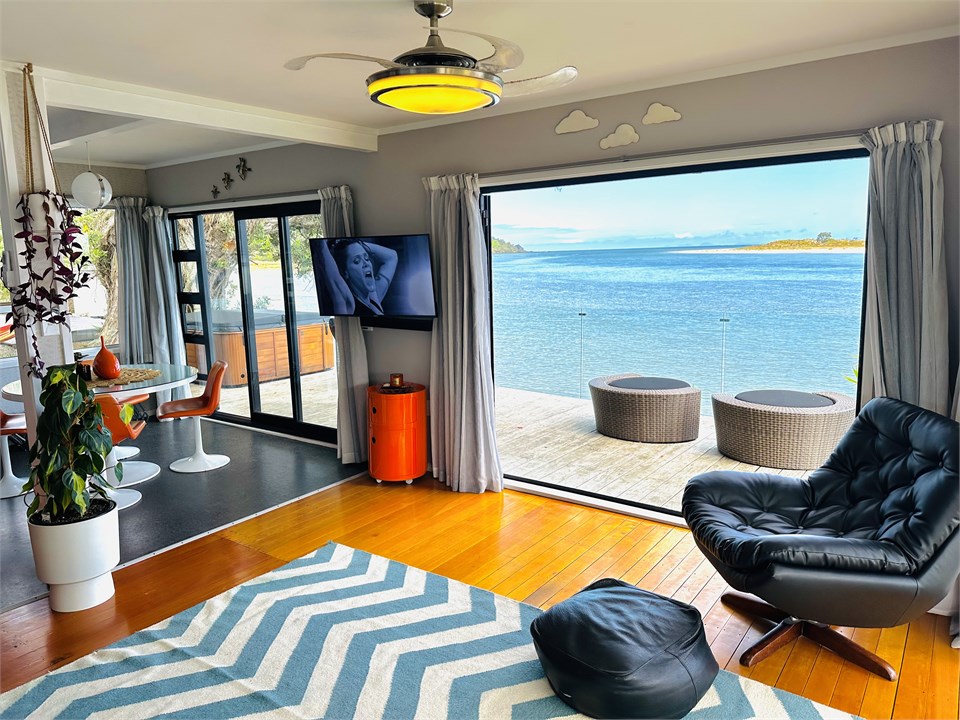 Downstairs lounge leading to the large deck.