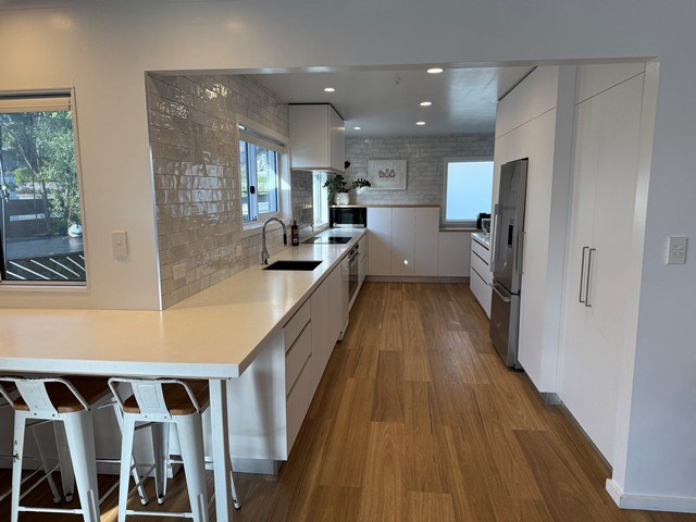fully equipped kitchen with 2 stoves