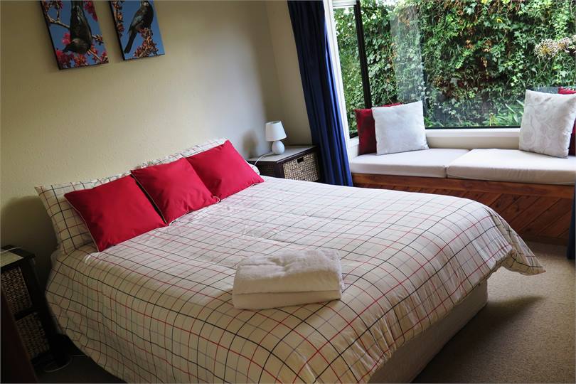Second Queen bedroom with a charming window seat