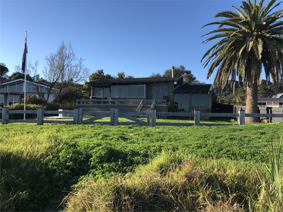 Standing on the beac looking at our house