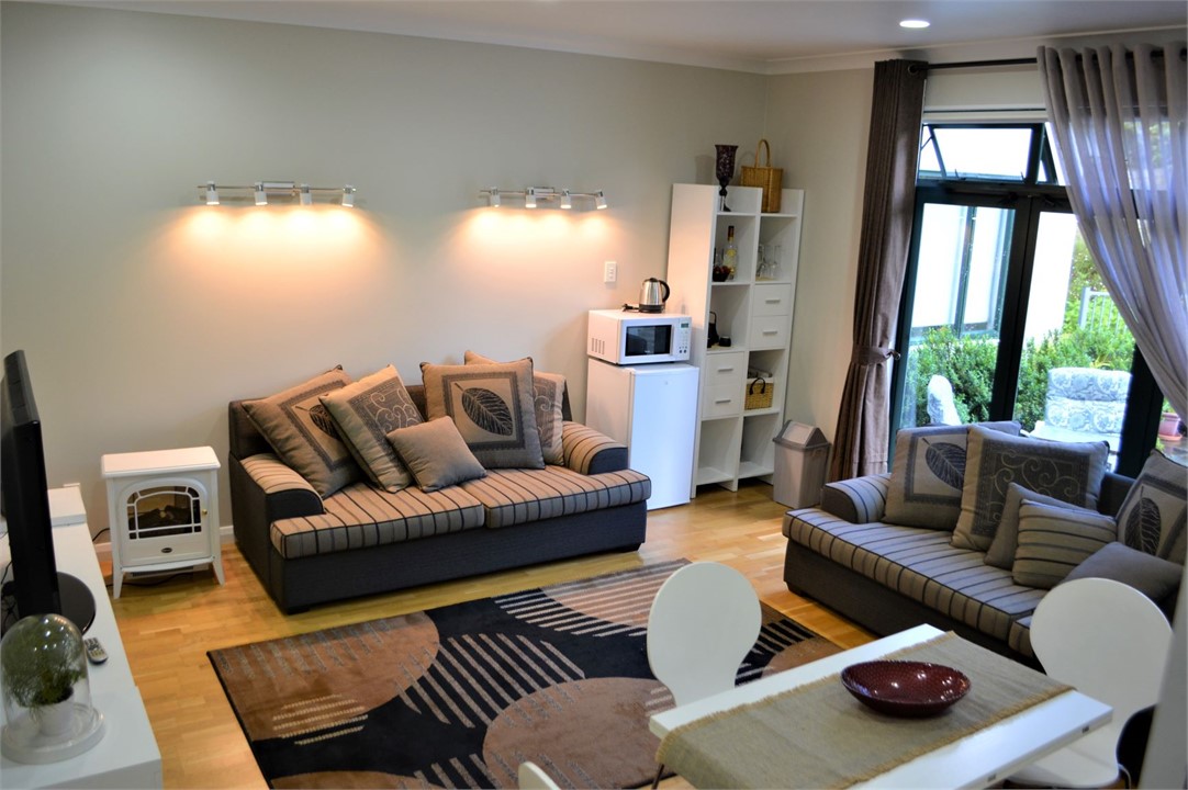 Lounge room with light meal preparation bay