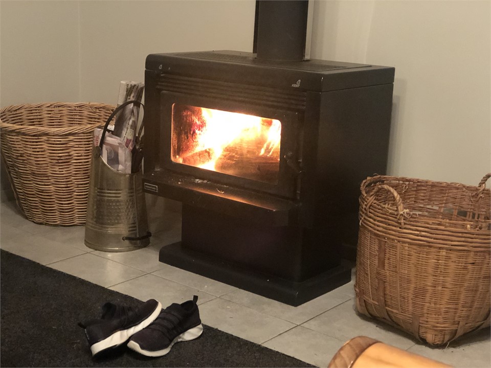 Warm efficient wood fire heats the whole house