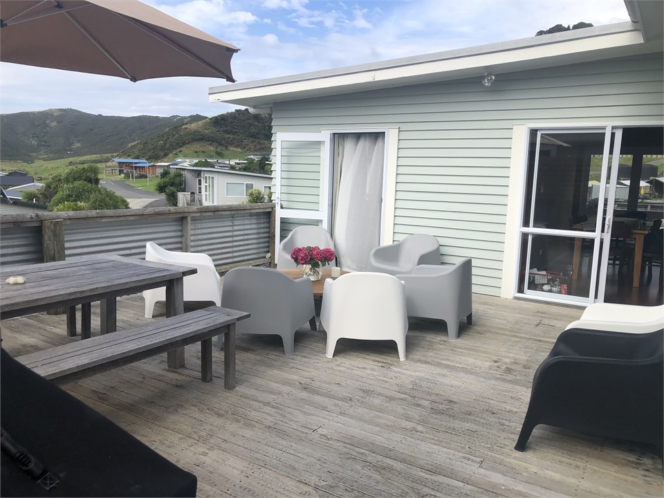 Front deck - doors to Bedroom 1 and dining/living
