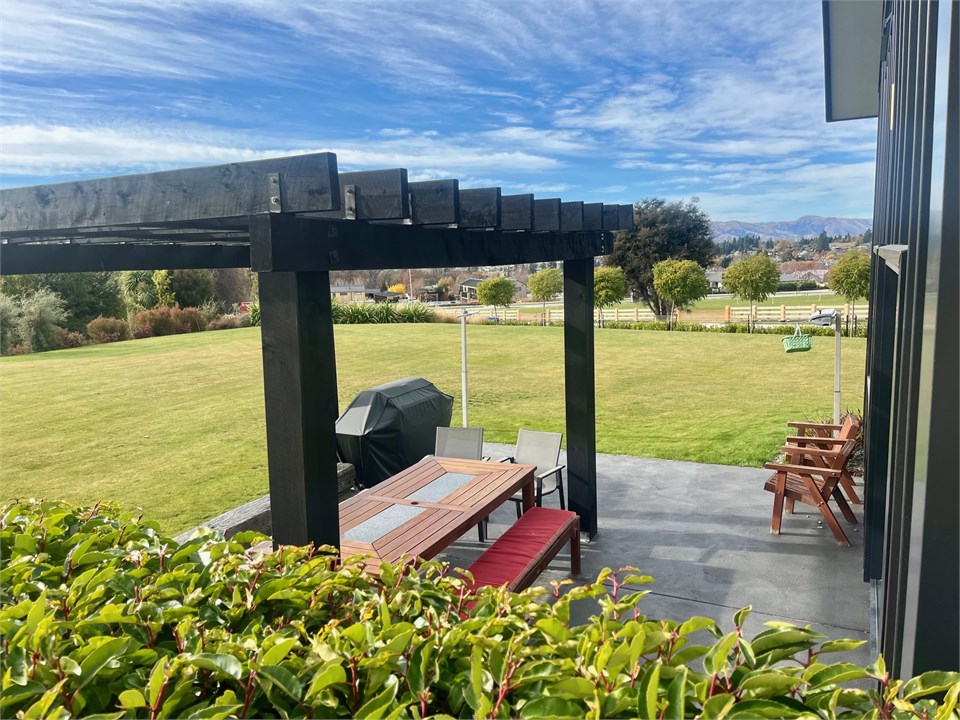 Private patio and grassed area, with BBQ and furni