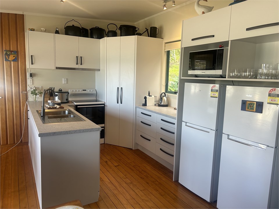 2 fridge freezers in kitchen area