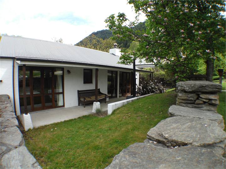 Front veranda with seating and outdoor fireplace