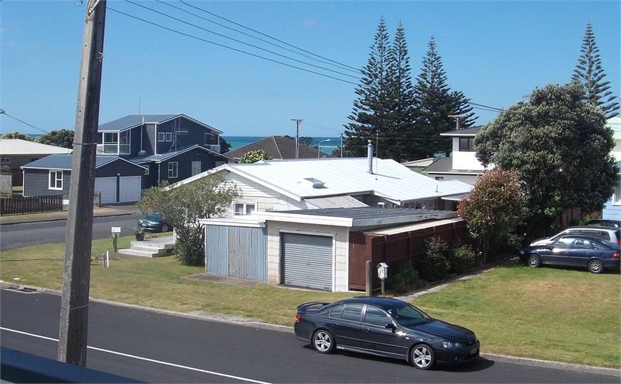 Upstairs view (& adjoining road to beach)