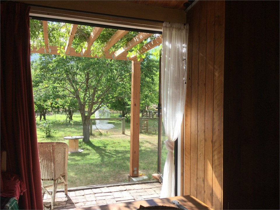 French doors open to pergoda