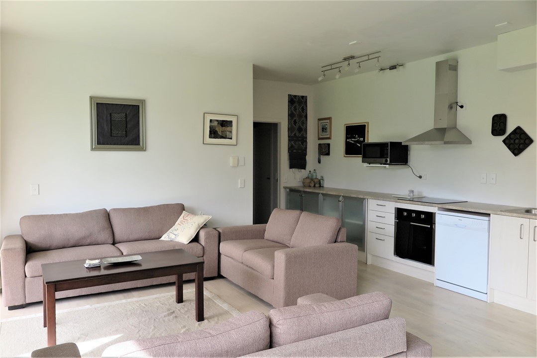 Living area with slider door to garden