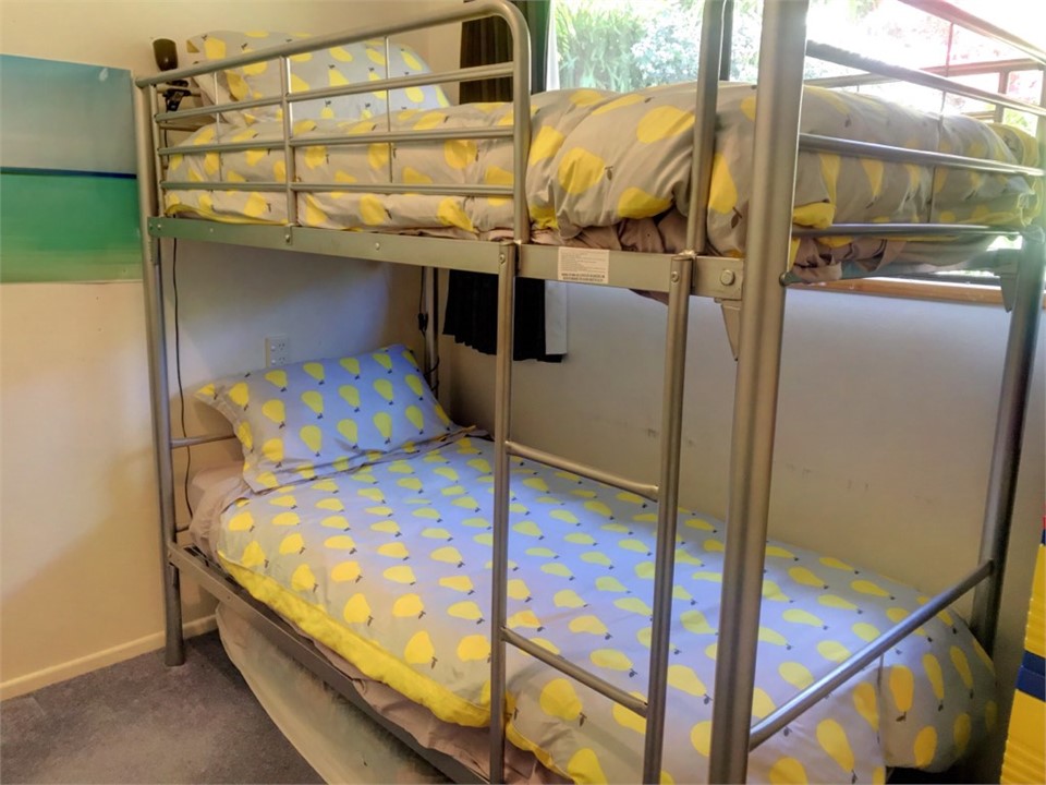 Bedroom - downstairs, single bunk beds, bookshelf