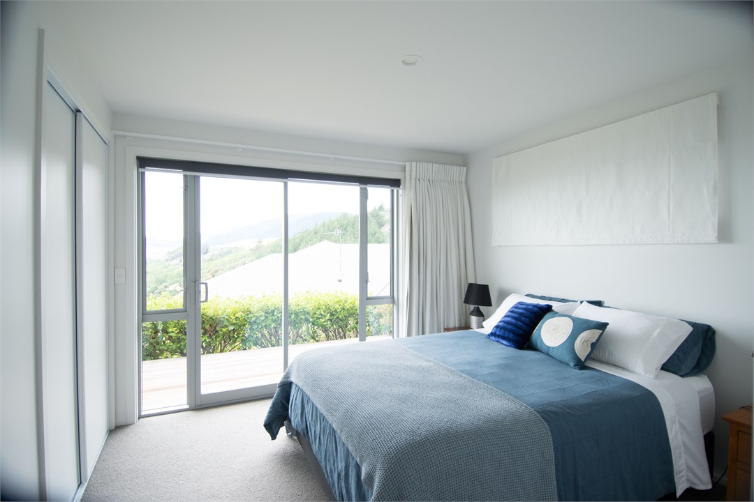 Peaceful downstairs second queen sized bedroom