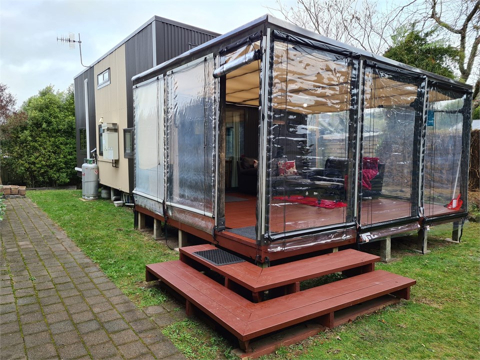 Enclosed entrance porch, deck and outside seating 