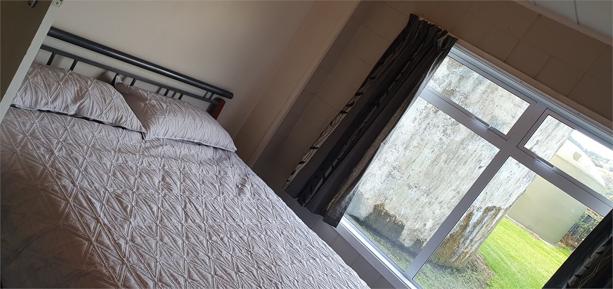 downstairs queen bedroom