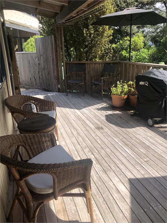 Deck - windows and door of studio,  privacy gate, 