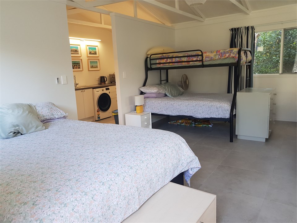 Bag storage at end of beds