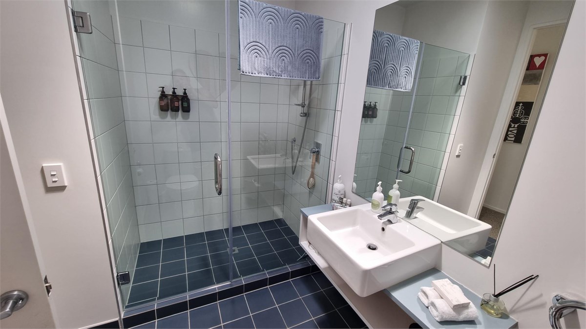 Bathroom with 2 person sized shower