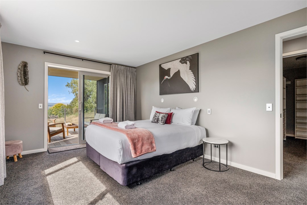 Master bedroom with private deck & ensuite