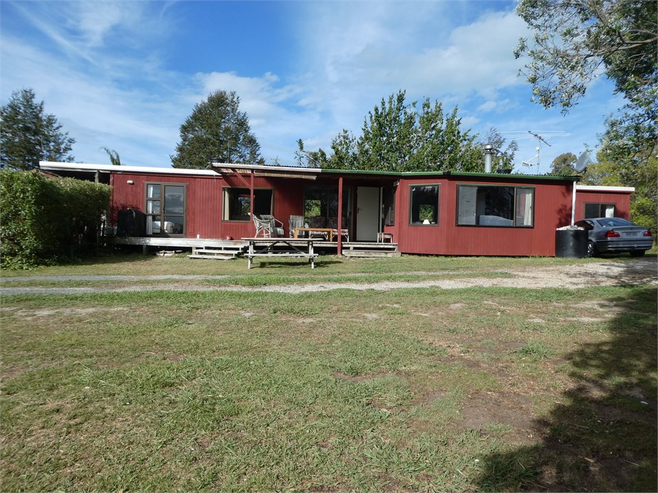 View of cabin with sunny afternoon deck