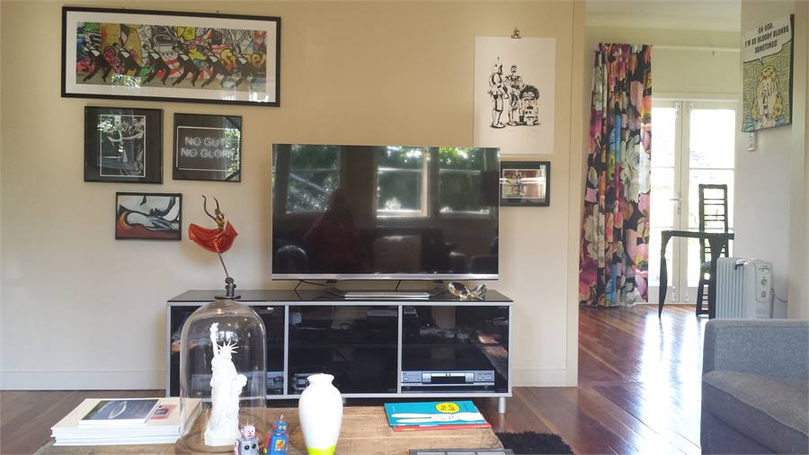 TV and further photo of lounge