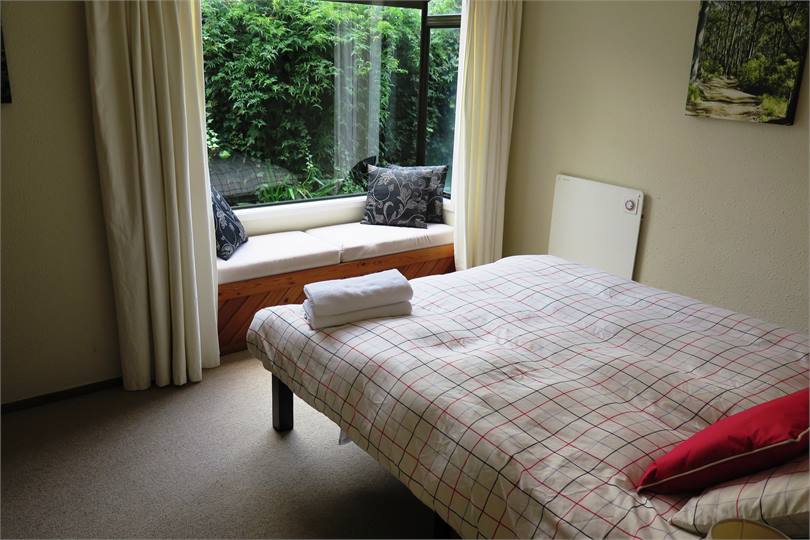 Quaint window seat in the third queen bedroom