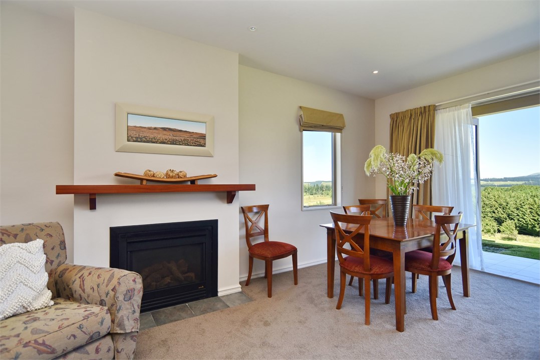 Seating and Dining areas with a Gas log fire