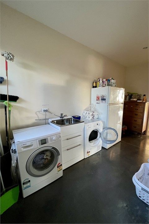 Large well equipped laundry