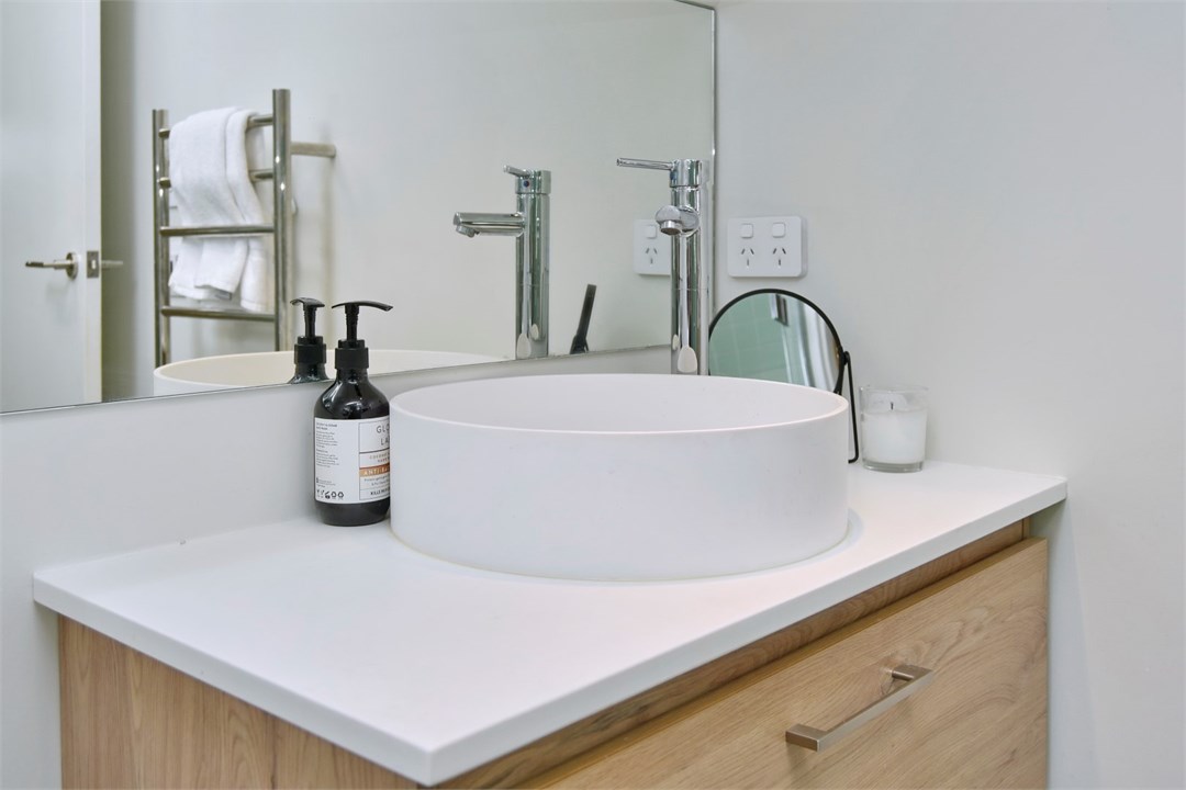 Bathroom has a shower and a toilet