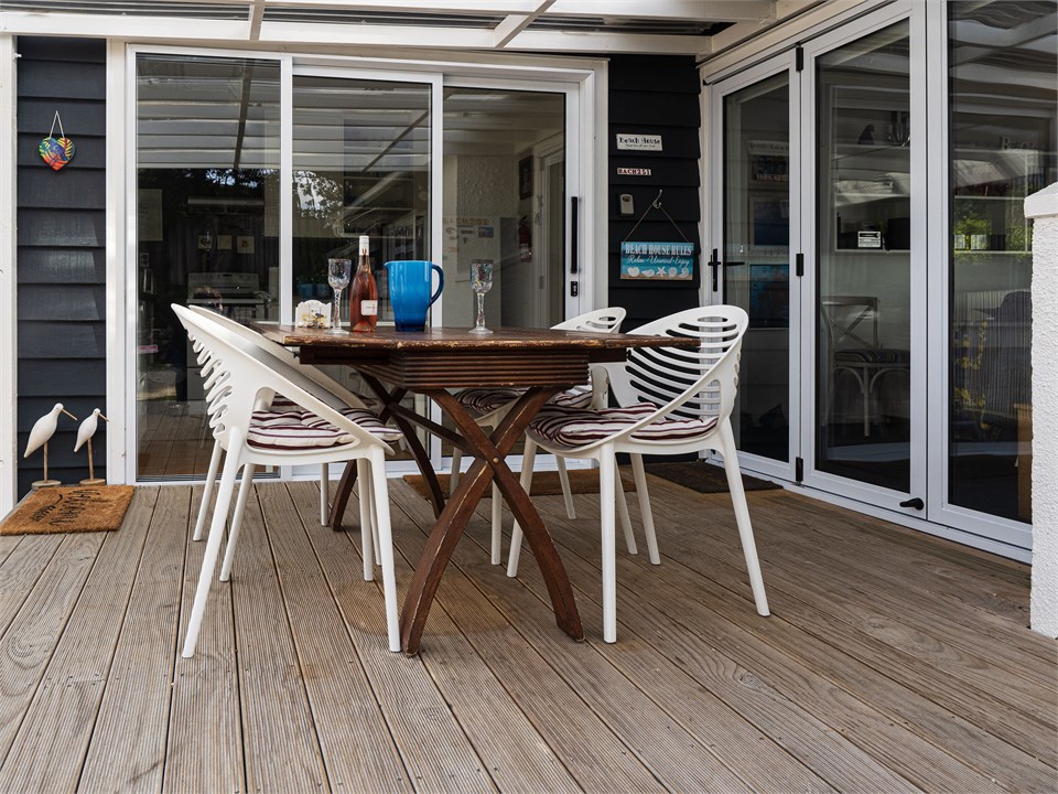 Covered deck enjoys morning sun